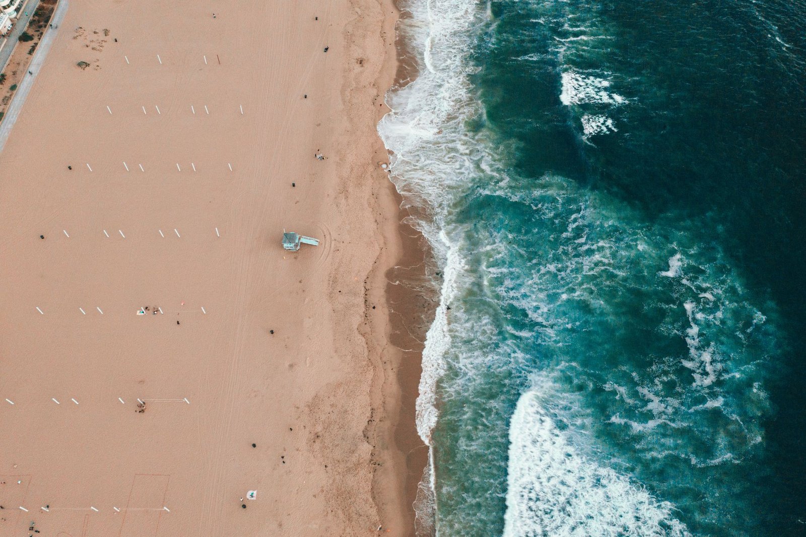 Aerial view of a California coastline with the Seas & Keys logo mark