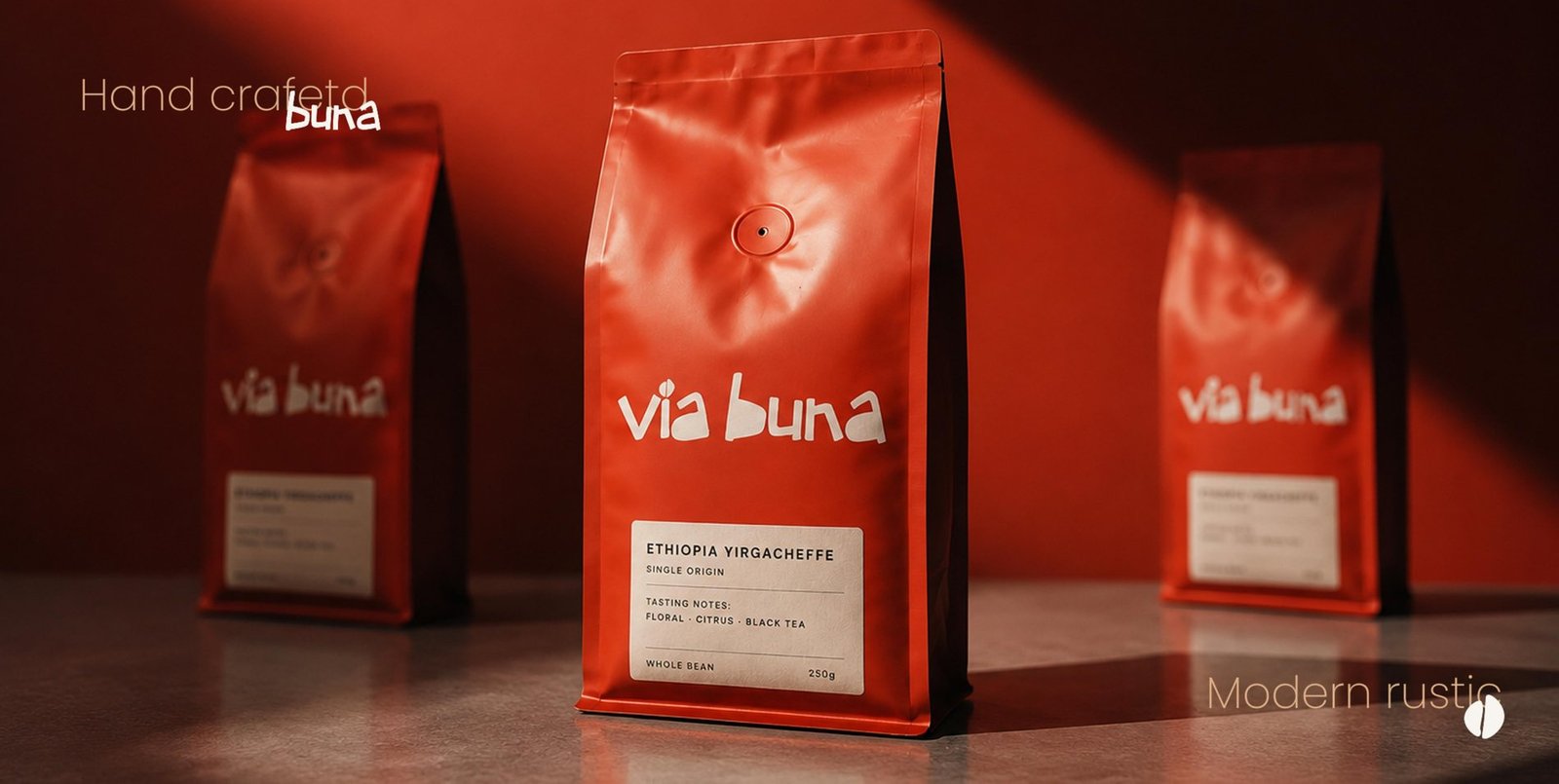 Three Via Buna Ethiopia Yirgacheffe whole bean bags in rust orange foil