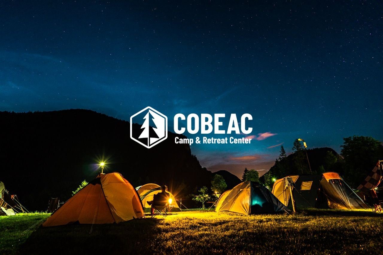 Cobeac Camp & Retreat Center logo over a starlit campsite with glowing tents